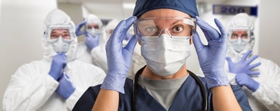 a medical professional wearing personal protective equipment