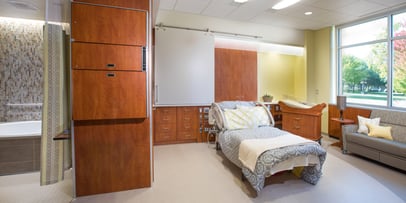 a hospital bed in a patient room